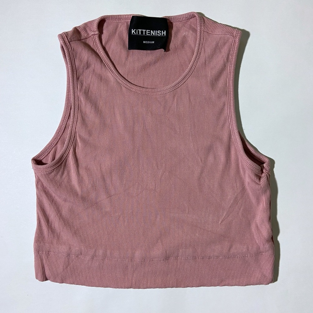 Kittenish pink ribbed tank top
Very stretchy and sof